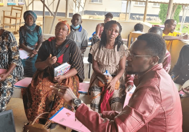 VHT Orientation meeting on reporting tools with VHTs at Kyarusozi min